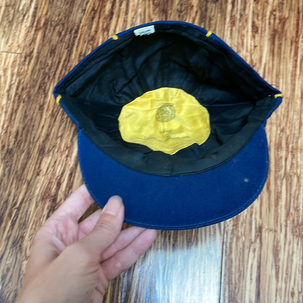 Vintage boy’s blue Cub Scouts uniform hat